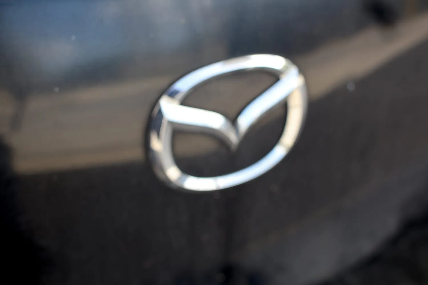 Mazda emblem on a vehicle at Japanese Auto Tech in Miami