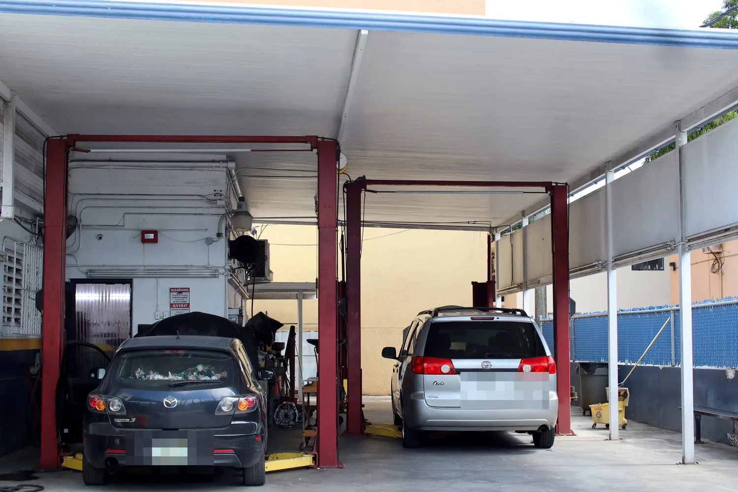 A vehicle in the service bay for a pre-purchase inspection at Japanese Auto Tech