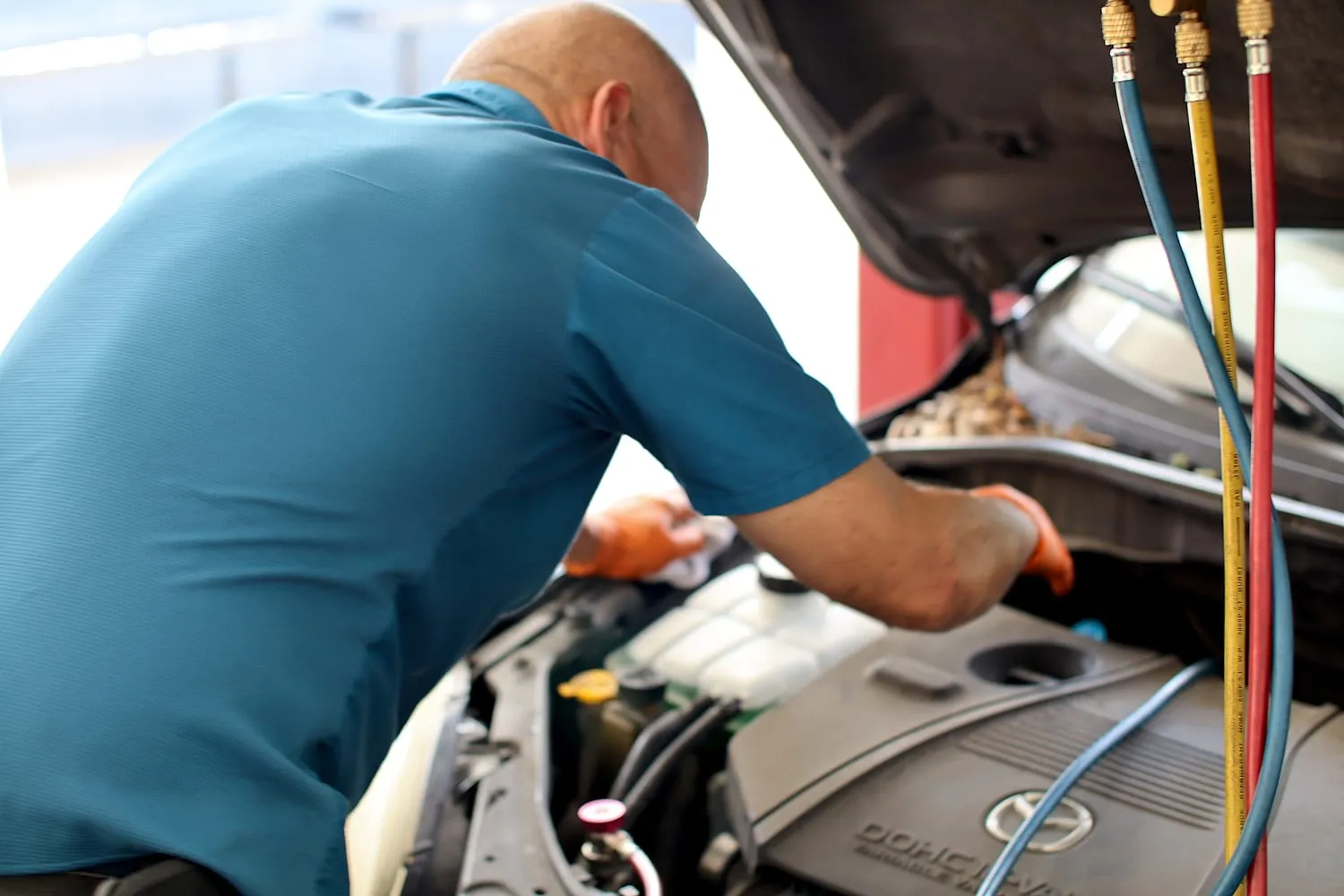 Technician performing engine repair at Japanese Auto Tech in Miami